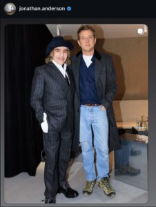 Screenshot of Jonathan Anderson's Instagram post with John Galliano at the show