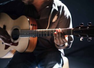 person playing guitar