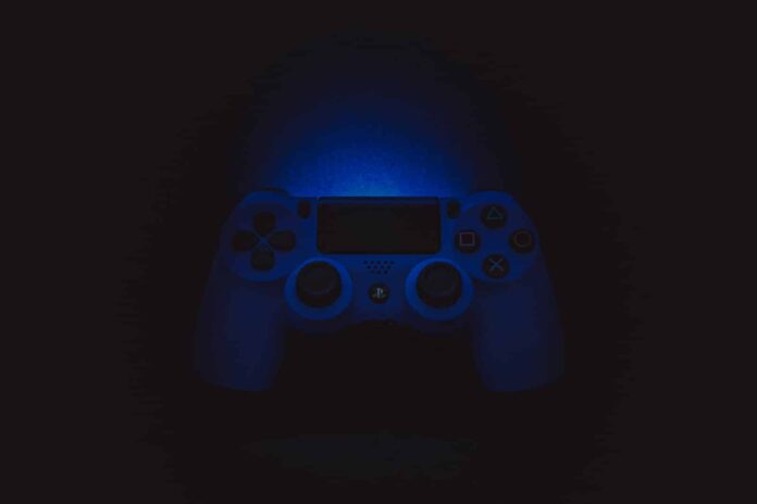 silhouette photography of Sony DualShock 4