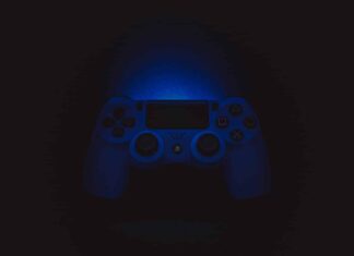 silhouette photography of Sony DualShock 4