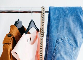women's four assorted apparel hanged on clothes rack
