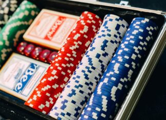 closeup photography of poker chip set