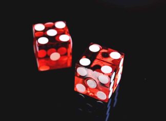 two red-and-white dices
