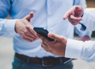 person holding black smartphone