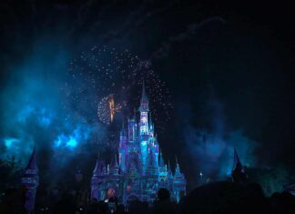crystal castle with fireworks at night
