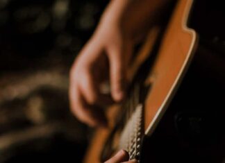 person playing guitar