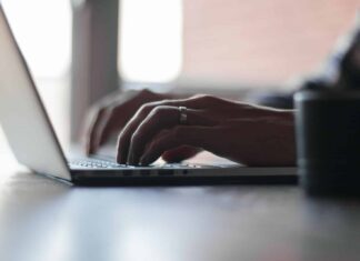 person using laptop