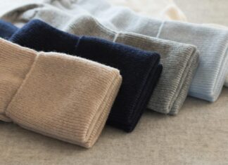 brown textile on white and blue textile