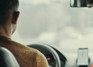man driving vehicle