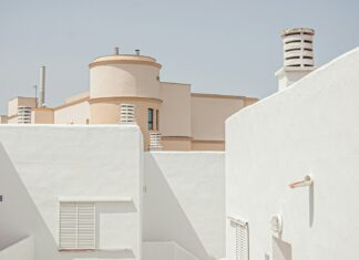 white concrete building under blue sky during daytime