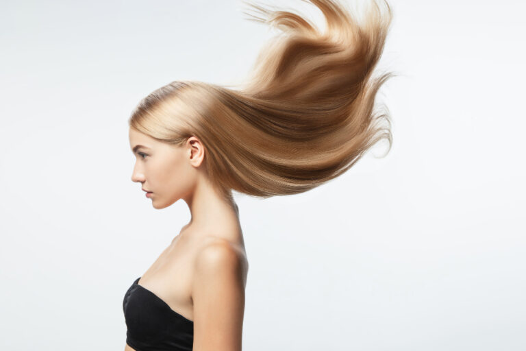 Natural Hair Growth Solutions: The Benefits of Essential Vitamins