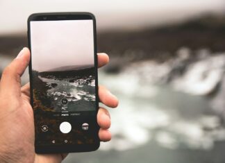 person holding black Android smartphone