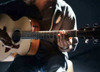 person playing guitar