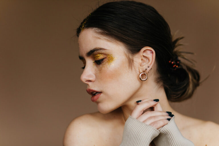 Timeless Elegance: Mixing Minimalist Gold Earrings with Statement Danglers for a Chic Look
